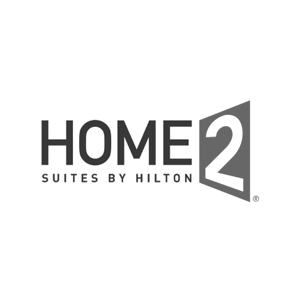 This is a logo for Home2 Suites by Hilton, featuring the brand name and a stylized number 